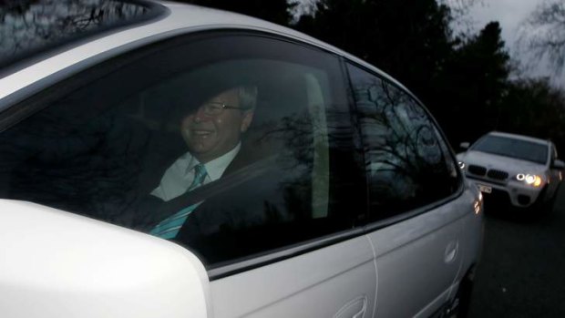 Off to be sworn in: Prime Minister designate Kevin Rudd leaves his Canberra hotel on Thursday morning.