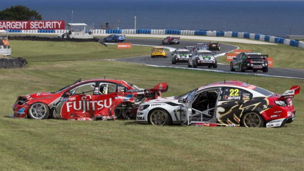 The aftermath of James Courtney's 110km/h crash with Alexandre Premat.