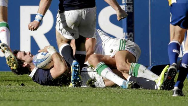 Over: Scotland's Alex Dunbar scores during a Six Nations rugby union international match against Italy in Rome.