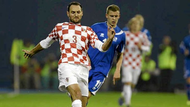 Led chants: Croatia's Australian-born defender Josip Simunic.