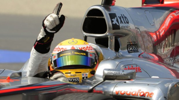Lewis Hamilton, of McLaren, celebrates victory in the Canadian Grand Prix.
