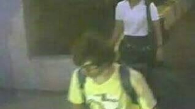 A CCTV image shows a man near the site of the Bangkok shrine bomb attack shortly before the blast.
