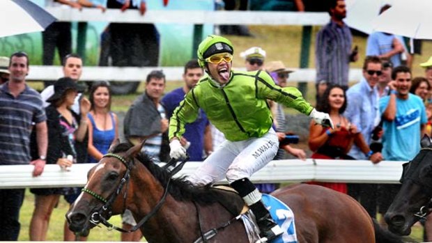 Back on top ... Michael Walker savours his New Zealand Derby victory in march on Military Move.
