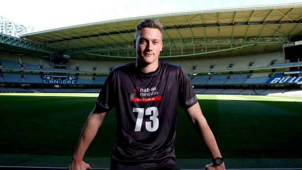 MELBOURNE, AUSTRALIA - OCTOBER 06: AFL draft prospect Mitch McCarthy poses for a photo at Etihad Stadium on October 6, 2016 in Melbourne, Australia. (Photo by Patrick Scala/Fairfax Media)