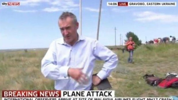 Sky reporter Colin Brazier at the crash site of MH17 in eastern Ukraine.
