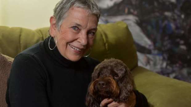 The secret's out: Nancy Cato and her hearing dog, Gilly.