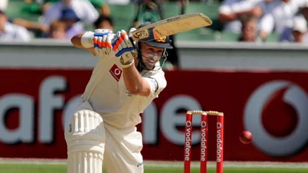 Mike Hussey executes a cover drive during his knock of 89.