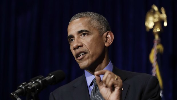 Barack Obama speaks during a news conference in Vientiane, Laos.