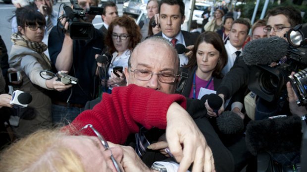 Carlos Sica tries to get his wife Anna away from media after their son Massimo was found guilty of murder.