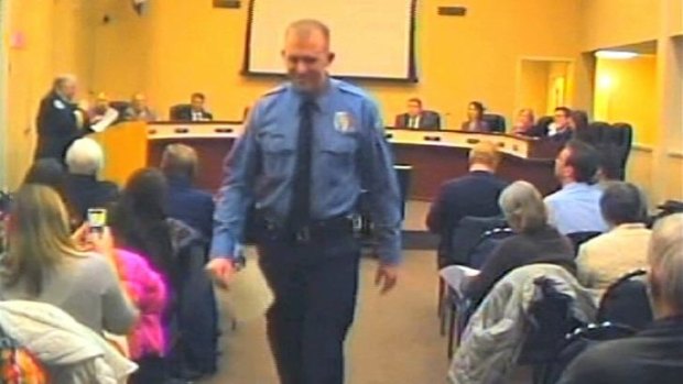 Police officer Darren Wilson attends a city council meeting in Ferguson, Missouri, on February 11.