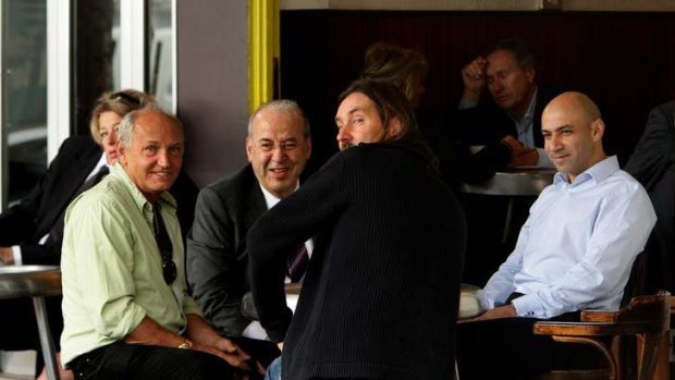 MP Eddie Obeid (2nd from left) has an early breakfast with his son Moses Obeid (right, blue shirt).