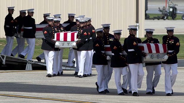 Slain US officials' caskets.