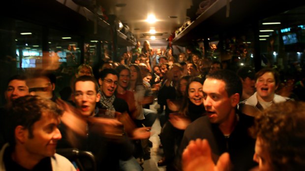Unfazed: Pilgrims from France  were not deterred by the   bone-rattling bus ride  for Sydney.  PICTURE: JUSTIN McMANUS