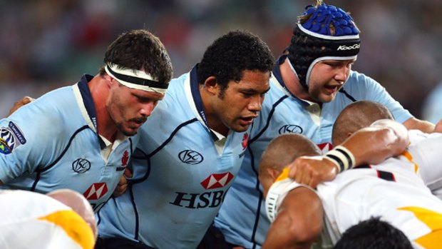Engine room ... Waratahs front-rowers Al Baxter, Tatafu Polola-Nau and Benn Robinson get ready for a scrum against the Chiefs last year. The set-piece battle for possession makes rugby unique and compelling.