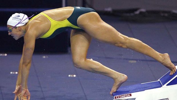 Stephanie Rice of Australia dives off the blocks during a training session.