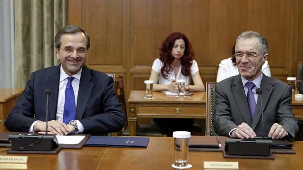 Greek Prime Minister Antonis Samaras (left) and finance minister Vassilis Rapanos.