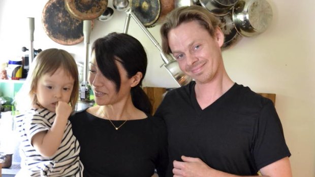 Stephan Alsman at his Brooklyn home with wife Sayuri and daughter Elisa.