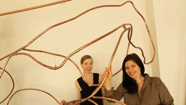 Partners ... designer Bianca Spender, left, and artist Anna-Wili Highfield with Highfield's horse sculpture.