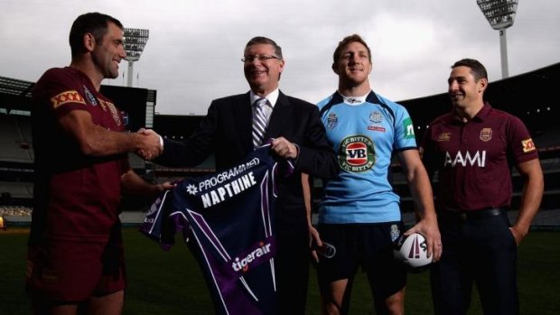 Melbourne Storm captain Cameron Smith, Victorian Premier Denis Napthine and Storm players Ryan Hoffman and Billy Slater pose for photos during Monday's announcement.