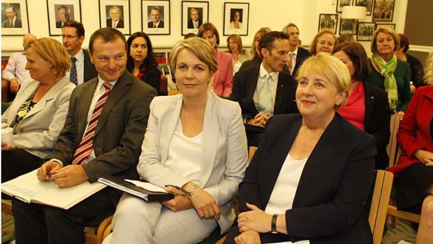 Tanya Plibersek, sitting with Jenny Macklin and Graham Perrett during the ALP caucus meeting, has been elected deputy Labor leader.