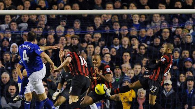 Match winner ... Everton's Darron Gibson fires home the goal that beat Manchester City.