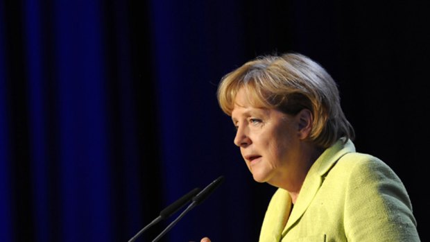 Angela Merkel addresses an election rally in northern Germany.
