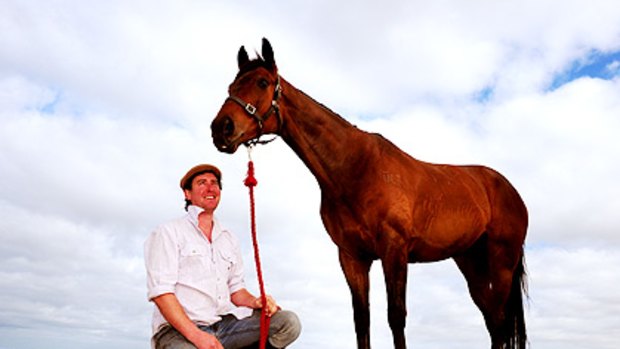 Eyes on the big prize: Trainer Todd Balfour at Carrum Beach with Melbourne Cup hopeful Gothic Crown yesterday.