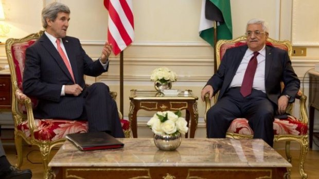US Secretary of State John Kerry, left, meets with Palestinian President Mahmoud Abbas.