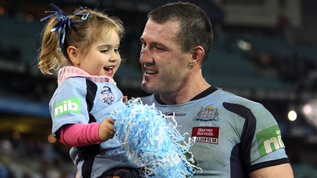 Dad the conqueror &#8230; Paul Gallen with daughter Charly after NSW's victory in Origin II in Sydney.