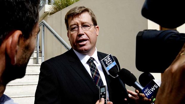 At the inquiry: Troy Grant speaks to the media.