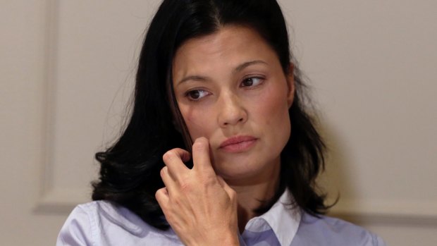 Another Weinstein victim, Actress Natassia Malthe reacts during a news conference in New York, 