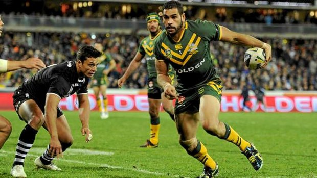Up and running: Greg Inglis during Friday's game.