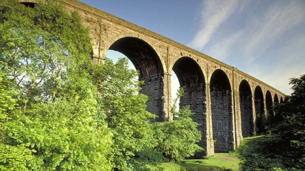 The 24-arch Ribblehead Viaduct carrying the Settle to Carlisle Railway near Dent, Cumbria.