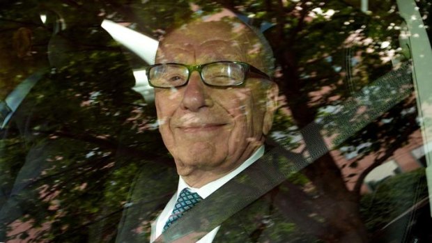 News Ltd Boss Rupert Murdoch leaves the HWT buildings in Southbank yesterday.