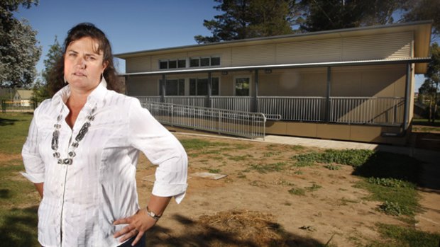 Too risky ... Fiona Suthern and Berridale School's $908,000 new building, which she says will stay empty because it does not have a safety exit door.