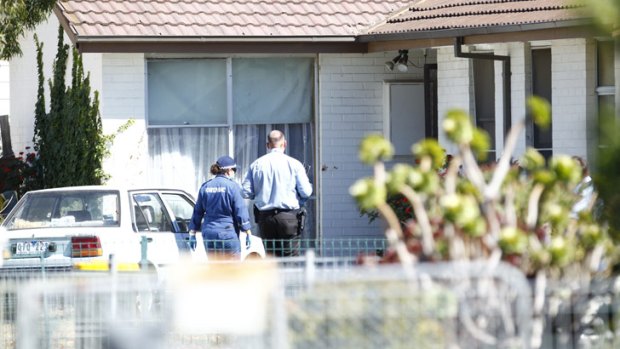 Police at the house in Roberts Crescent, Sunshine West, where a woman has been found dead.