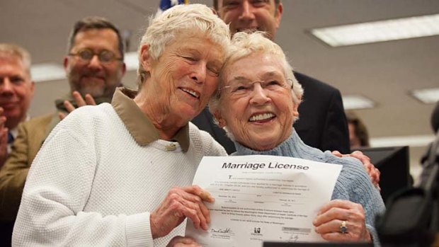 Happy ... Jane Abbott Lighty and Pete-e Petersen were the first to get a licence after Washington state allowed gay marriage.