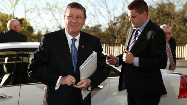 Victorian Premier Denis Napthine arrives for the Council of Australian Governments meeting at Parliament House in Canberra