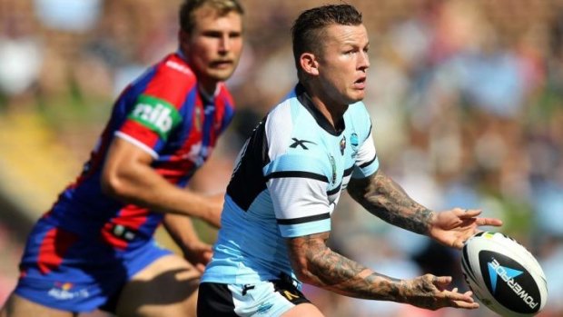 Missing in action: Todd Carney offloads against the Knights on Sunday.