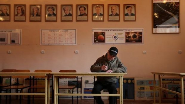Registering to vote: Ivan Kozlov at a polling station at a school in Sevastopol.