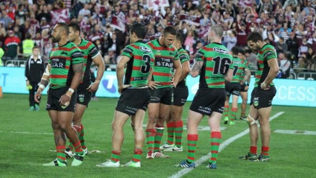 Dark day: Souths players come to terms with their loss to Manly in the 2013 preliminary final.