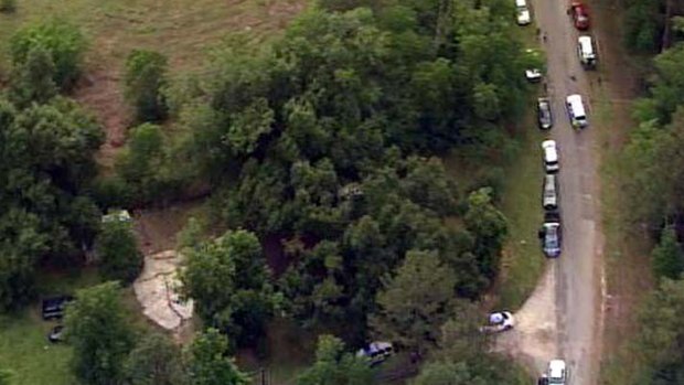US authorities investigate at a rural Texas house.