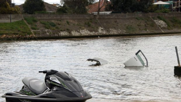 One floats, one doesn't ... Jet-ski beats car when it comes to handling in the wet.