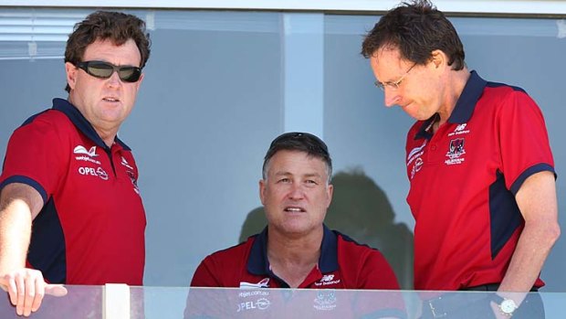 Chris Connolly, recruiting manager Todd Viney and chief executive Cameron Schwab talk at Melbourne's intra-club match on Friday.