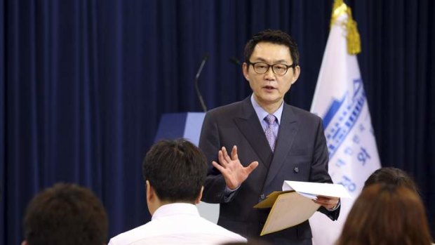 Yoon Chang-jung, spokesman of South Korean President Park Geun-hye, speaks in front of reporters at the presidential Blue House in Seoul in May.