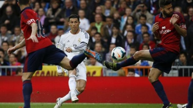 Unforgiving: Cristiano Ronaldo scores a goal for Real madrid.