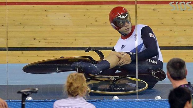Real downer ... Philip Hindes after falling down during the men's team sprint qualifying round.