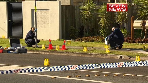 Police at the scene of a Coolum double murder and police shooting.