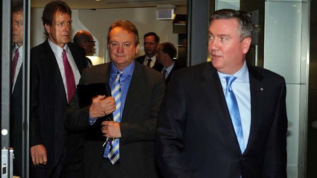Eddie McGuire emerges from the meeting of AFL club presidents on Thursday.