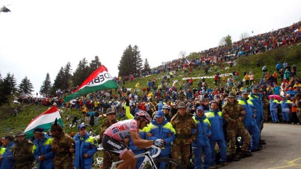 Grim ascent ... Alberto Contador is cheered up Monte Zoncolan, the last climb of the 14th stage of the Giro d'Italia, on Saturday. The Spaniard was cleared of doping charges by his home federation but is still subject to an appeal.